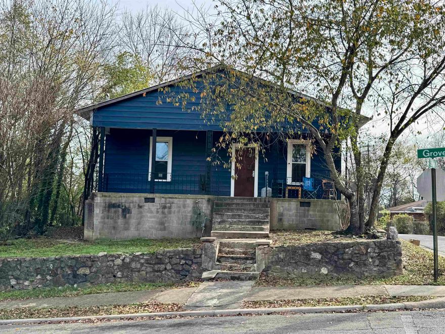 Investor Special! 5/2 very close to downtown and currently housing 7. Needs a little TLC but a lot of beds for the dollars! Offers off street parking, a metal roof, Central Heat/Air, and updated windows. Selling "As-Is".