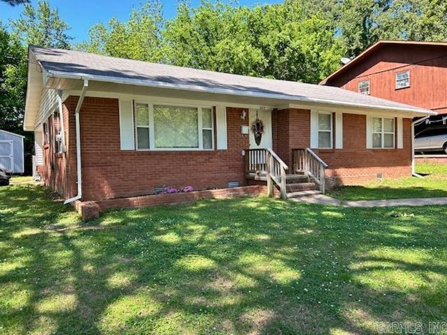 NEXT TO EVERYTHING FOR NEXT TO NOTHING! Perfect little first house OR retirement house! 3 bedroom, 1.75 bath BRICK home with almost 1400 square feet. Located near Lyon College, this property is well worth the call. Compact U-shaped kitchen has good counter top space and a small island that make it cozy and EFFICIENTLY designed. 3 bedrooms offer plenty of room for sleep, storage and play. Located on a corner lot with a fenced backyard and small detached storage building this property is a MUST SEE!