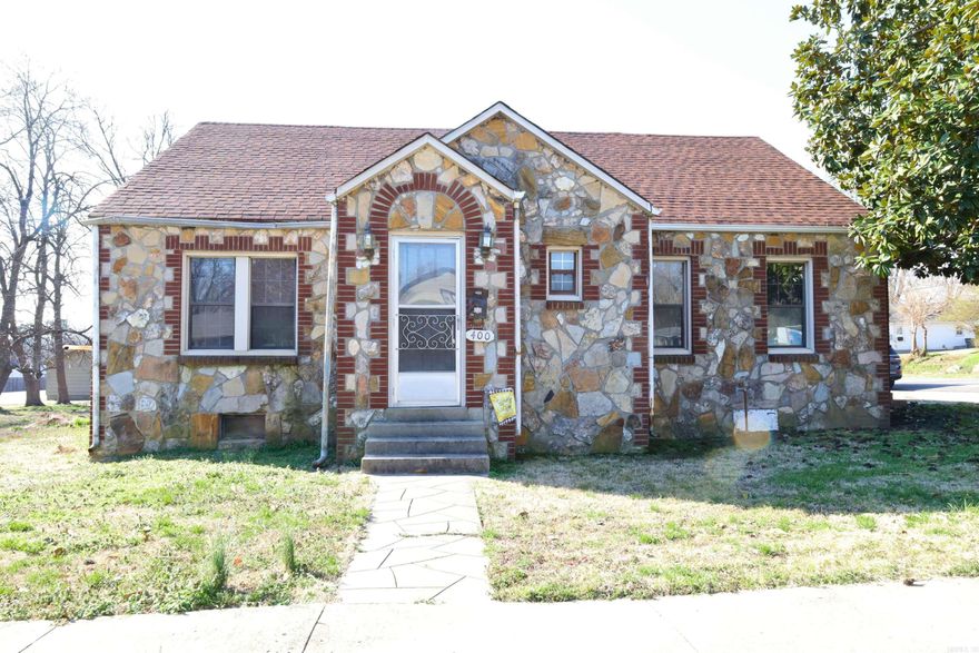 Check out the new price on this charming rock home conveniently located within walking distance of downtown Paragould. This 3-bedroom, 1-bath home includes an extra lot beside the house, offering great potential for both first-time homebuyers and investors. It features original hardwood floors, three accessible exterior doors, and solid construction with great bones. Whether you’re looking for your first home or a property to add to your investment portfolio, this one offers exceptional value at the new price. Schedule your showing today to see everything this home has to offer!