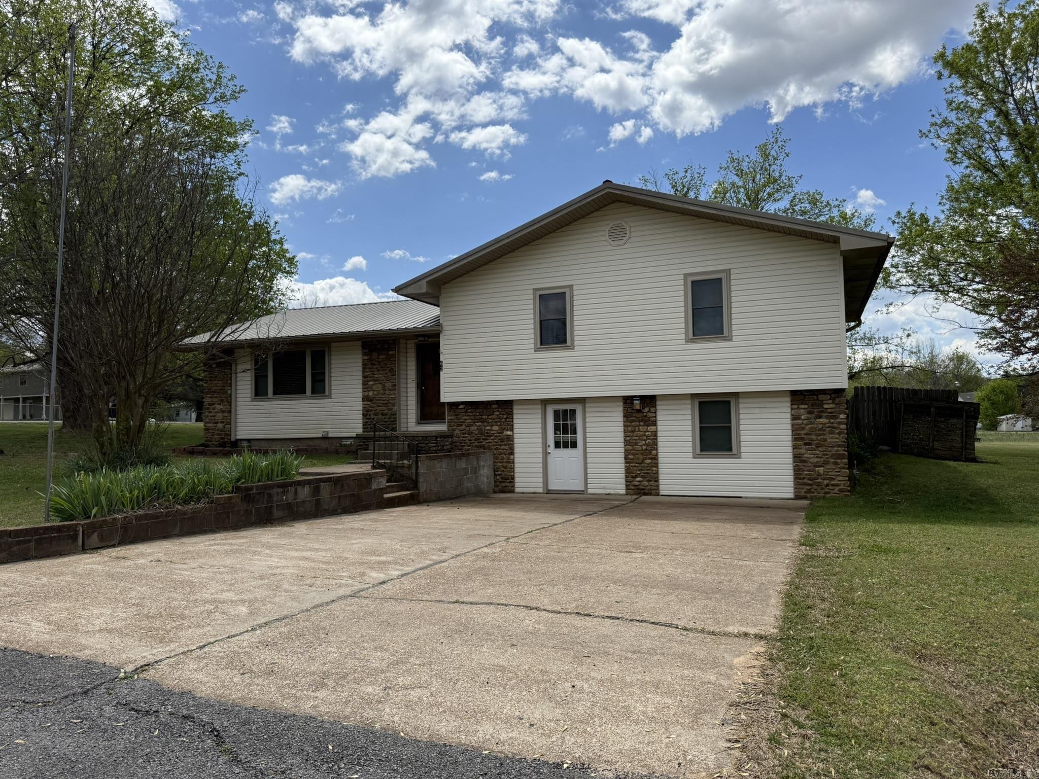 This 3 bedroom, 2 bathroom home is located in a desirable neighborhood, right in town, and sits on two spacious ½ acre lots, totaling approximately 1 acre. Offering 1,484 square feet of living space, the home also includes an additional 812 square feet of unfinished basementāideal for storage or future living space expansion. It also features also a large shed with underground electricity, lighting, and air conditioning already installed, making it an ideal space for a workshop or extra storage. The yard is a standout feature, with large shade trees and multiple fruit-bearing trees -including apples, peaches, and pears that surround the home and shed. With ample space and convenient waterspouts, itās an ideal setup for a large garden if desired. A two-car carport offers convenient parking, while a backyard patio provides a great space for entertaining or relaxing in a peaceful setting. This property combines the best of small-town charm with the comfort and space youāve been looking forāall for just $185,000.