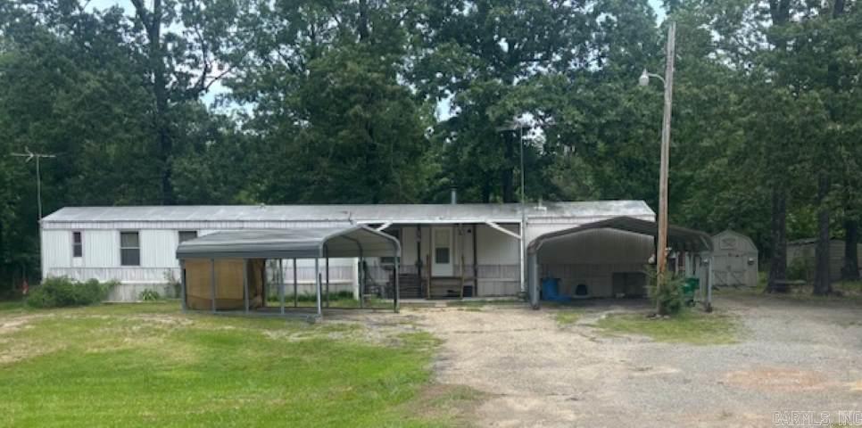 welcome to your peaceful retreat, this well maintained 3 bedroom 2 bath mobile home sits on nearly 3 acres of serene countryside, offering the perfect blend of space, privacy and comfort, inside you will find an open floor plan with a bright living area with a large kitchen with plenty of cabinet space and a cozy dining room, the primary suite includes a full en-suite bathroom while the two additional bedrooms are great for family, guests, or a home office, this home also has a large add on to use as a den, or living area. step outside to enjoy the wide- open views, mature trees and endless possibilities. located in a quiet rural setting but still just a short drive to local amenities, this property is perfect for anyone looking to enjoy county living without being to far off the grid.