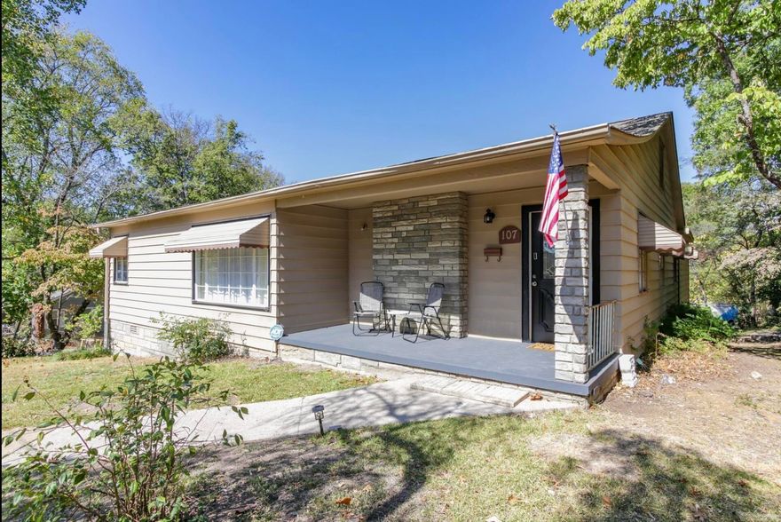 This adorable 3 bed 2 bath home will not last. Located between Central Ave and Oaklawn Casino, market and shopping near by. This beautiful home has a large open kitchen, spacious rooms and original hardwood floors, makes this house comfortable! Upon entering the house the living room overlooks the dining room and kitchen making entertaining a breeze. The kitchen opens to the back door and down the stairs leads to the separate laundry and locked storage area and 2 car garage and a cozy back yard with concrete pad great for putting up your own patio table or out door dining area.  Furniture is negotiable but not included. This home is an approved Short Term Rental with Permit and is a great investment opportunity great location for tourists and attraction to it's close proximity to Oaklawn Casino and the Bath House Row and downtown restaurants.  Appliances Included: Dishwasher, Refrigerator, Gas Stove Oven, Garbage Disposal, Washer & Dryer.