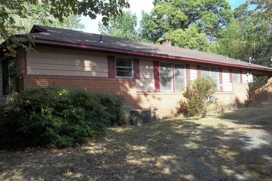 On the way to the State Lodge you will find this ranch style home. Spacious rooms through out. Built in desk and shelves. Nice size laundry room with closet and shelving. Water Heater was replaced in 2023. Screened in back porch. 2 storage buildings. Priced to sell. Needs updates. Home is being sold "As Is" with no repairs made by seller. Near proposed bike trails and all city amenities. Agents see remarks.