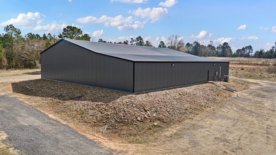 Opportunity meets versatility with this impressive 9,600± sq ft commercial event center located on Morgan Road in Dover, Pope County. Currently operating as a sports center, this metal-framed, completely foam-encapsulated facility offers endless potential for a wide range of commercial, recreational, or event-based uses.  Positioned on approximately 0.90± acres, the property features a spacious open layout designed to accommodate large gatherings, athletic activities, training space, entertainment, community events, or future business expansion. Additional features include two bathrooms, an office space, and upstairs storage, adding both functionality and convenience to the layout.  The durable commercial-style construction offers low-maintenance appeal while providing the flexibility to customize the space to fit your vision. Whether you are looking to continue its current use or transform it into something entirely new, this property presents a rare opportunity to invest in a versatile commercial space with excellent potential in a convenient Pope County location.