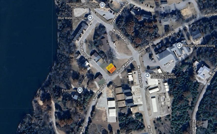 Time to add a small business that is close to the water on Table Rock Lake of Holiday Island in Carroll County! This corner commercial property is 2 parcels that equal a .06 (+/-) lot which is flat and cleared with a few trees. It is close to other local amenities and only minutes from Eureka Springs. Owner financing is available. Property conveys a Limited Warranty Deed. Call or text for more information.