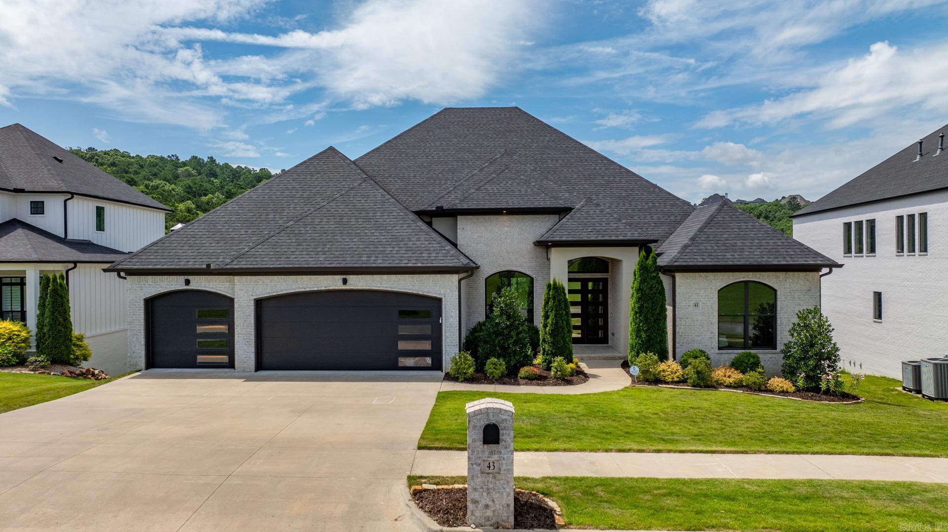 Gorgeous newer construction in beautiful Falstone of Chenal Valley. Gorgeous street appeal and stunning interior. The perfect setting for family living and entertaining! Fabulous floor plan and spectacular decor. Open dining area, spacious family room with fireplace and built-in with access to covered outdoor terrace with grill station. Incredible gourmet kitchen with top-of-the-line appliances and custom cabinetry with large center island that flows into breakfast area. Lux spa inspired primary suite along with two additional guest bedrooms and separate office all located on the main level. Upper level consists of Game/media room and guest bedroom suite. 3 car garage and fabulous backyard with greenspace.