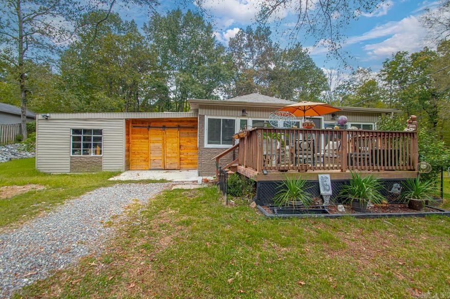 Take a look at this beautiful country home sitting on just over 3 peaceful acres!! This home has charm for days and appears to have the original hardwood flooring throughout most of the home. This home features a very spacious and open floor plan with large bedrooms, tons of storage and a huge sunroom with energy efficient windows. Outside you will find a area that is set up for RVs with electric, water and septic complete with a new pump (could be additional income). Outside features a stand alone well and a large fenced area that is perfect for pets and livestock plus has tons of hickory trees throughout. The carport has recently been enclosed and has several upgrades such as 220 wiring to the outside corner, new lighting, and new concrete floor installed making a very spacious workshop and storage area! If you are tired of the subdivision life and looking to enjoy nature, wildlife and even start getting into the homesteading lifestyle than this property might just be the perfect fit for you!  Call me or your local agent today to get more information and to schedule a private tour of this beautiful property.