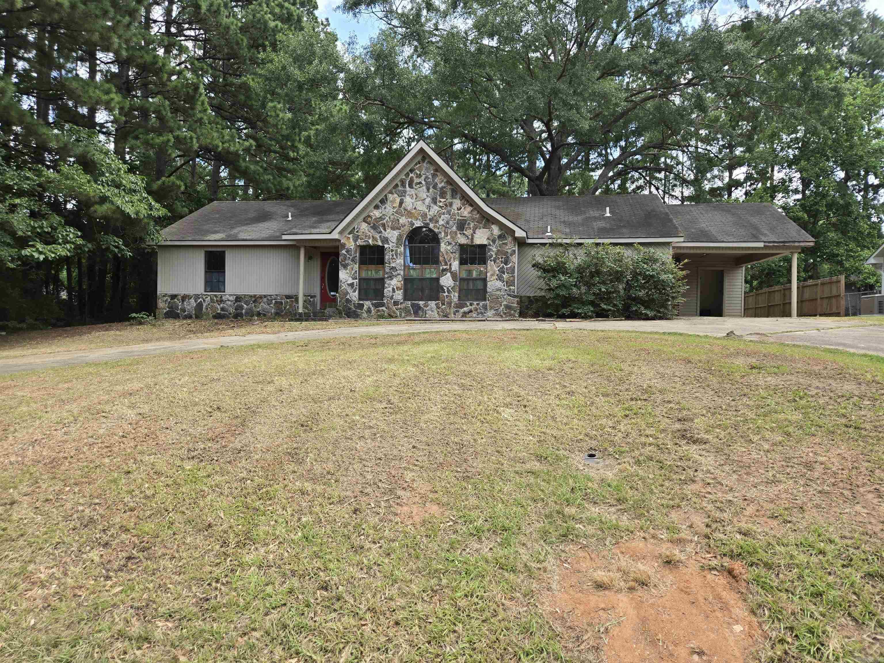 Charming 3 bedroom, 2 full bath home featuring vaulted ceilings and floor-to-ceiling windows in the living room, offering abundant natural light and a spacious feel. Enjoy a large backyardāideal for entertaining or relaxing outdoors. Additional highlights include a carport and solid structure ready for your personal touch. Sold as-is, this property is a great opportunity for investors or first-time homebuyers looking for a starter home with potential.