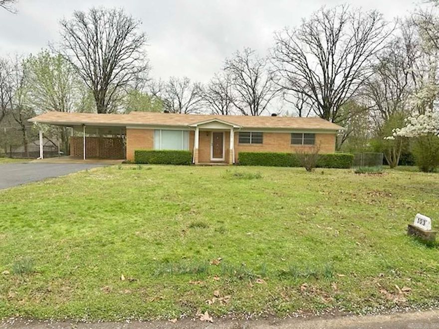 Great home with a little Mid-Century flair !  This home is convenient to everything Hot Springs has to offer!  A spacious, level lot with a fenced back yard with storage building! Recent roof! 2 car covered parking - large covered patio!  Great starter home or rental investment!