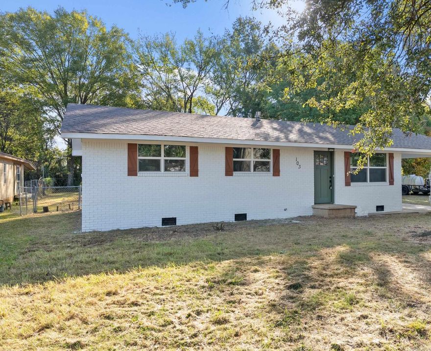 Beautifully remodeled home framed by a mature shade tree in McCrory! New HVAC condenser, new water heater, new windows, and a new roof!  The new roof should save lots of money on insurance costs and new windows should help keep electric bills low.  Open floor plan with large living room that is open to the kitchen. Kitchen features all new appliances and granite countertops.  New paint and fixtures throughout the home.  The gorgeous luxury vinyl floors complement the paint colors very well.  Large laundry room just off the kitchen.  3 bed/2 bath. The partially fenced back yard is flat and has shade.  It has great potential for creating the perfect outdoor space for entertaining. One car carport.  Convenient location in town close to schools, shopping, and dining.