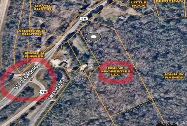 LETS MAKE A DEAL!! PROPERTY ZONED C-3! Take a look at how close this property is to the interstate! PRIME location and Endless possibilities on this one. Plenty of acreage for you to get creative and use for your business or investment property. Home on property has been stripped but is 3 bedroom, 2 bath and has 2 living areas. Please see survey in assoc. docs. Property is in flood plain, please call listing agent or Co-List agent (Brian Woods) for details! 501-794-7939. BRING AN OFFER!!