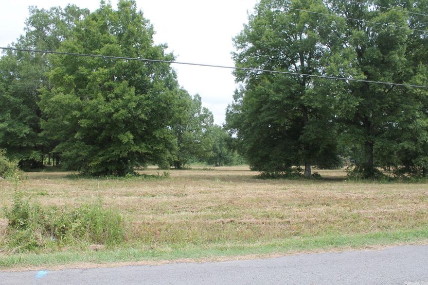 Beautiful 3 acres with mature trees. This has a feel of country with city amenities. Building restrictions apply.
