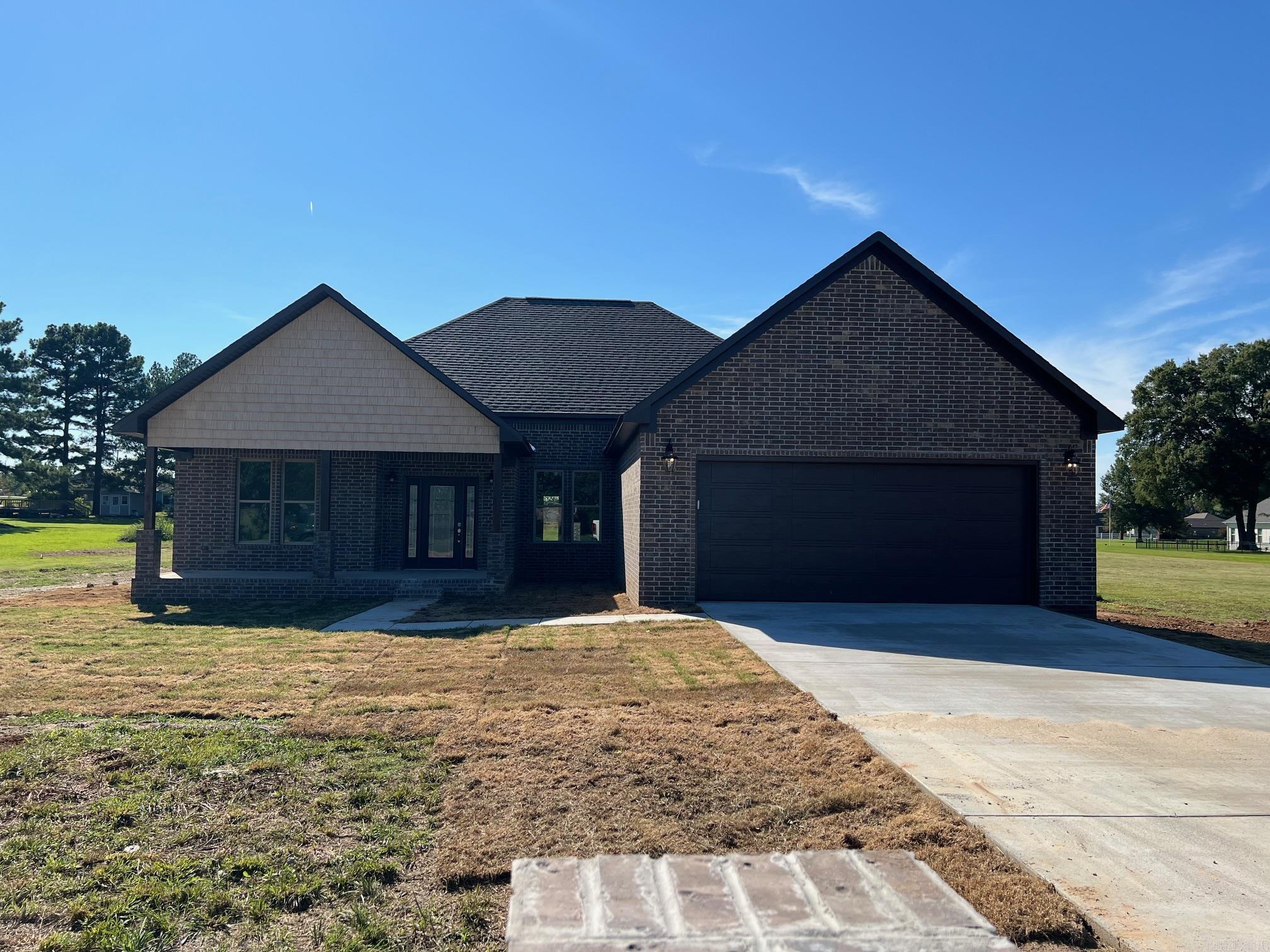 New Construction Home on over a acre of land. Three Bedrooms Two Baths plus a office. This home is over 1900 Sq feet which means big spacious rooms. 12 foot tall ceiling in the living room. Kitchen has a 9 foot granite bar overlooking the living room. Tankless hot water heater. Soaker tub in the master, walk in tile shower in master. Covered front and back porches. This is a Nice Custom home.