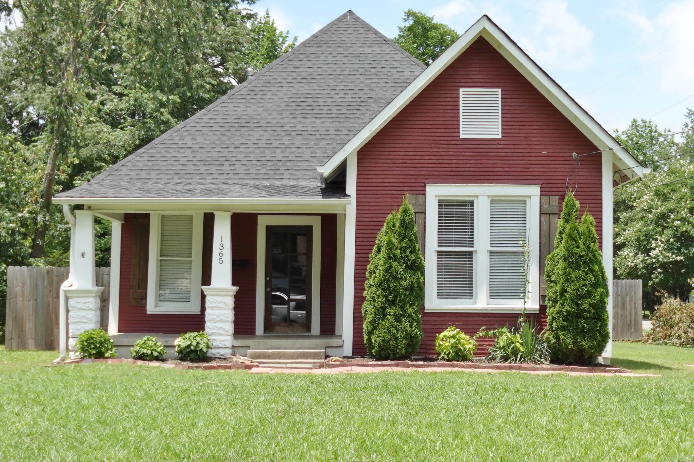 Sweet 3BR/2BA dollhouse on a corner lot that was remodeled approx. 4 years ago. Split bedroom plan. Remodel includes: roof, HVAC, water heater, plumbing, electrical, gas stove, granite in Kitchen and both bathrooms, double sinks in primary BA, tile showers to the ceiling, vinyl flooring (no carpet), wood ceilings and paint. Tall ceilings with lots of natural light, can lighting and ceiling fans. Nice pantry and walkup stairs to attic off kitchen. Big walk-in closet in primary and nice size closets in other BR's. Sellers have fenced entire backyard with a double gate on Independence St side for parking, deck off laundry room, raised beds for gardening, installed gutters, blinds and resurfaced primary tub. Shed in backyard conveys. As if this weren't enough it also comes w/ refrigerator, GE Profile washer and dryer!! Conveniently located - 1.2 miles from UCA, .7 miles from Hendrix and .8 miles from the heart of Downtown Conway.
