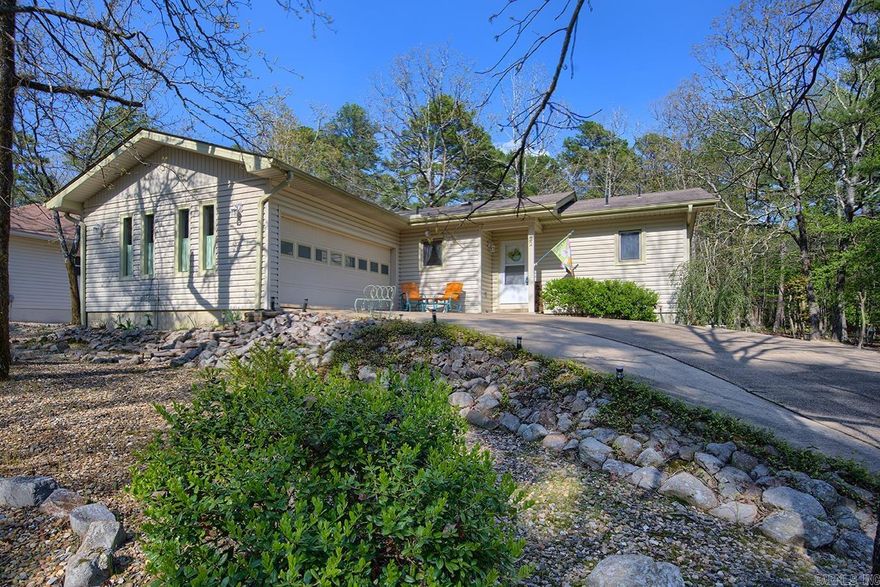 DON'T MISS SEEING THIS ONE! Charming 2-bed, 2-car garage home centrally located in beautiful HSV. All essential elements have been updated: New roof 2016, new heatpump & air handler 2016, new stainless stove 2016, new dishwasher 2016, new deck 2020. Updated kitchen features also include granite counters, gorgeous cabinetry, & side-by-side refrigerator. Front loading washer & dryer convey! Master bath includes all-tile walk-in shower. Lovely woods to right & rear of the house for privacy. New Landscaping, Stain Deck, Laundry Room in garage, with Remodeled Kitchen. Buy in Fee of $2000.00 at closing