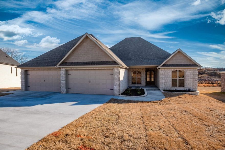 Located in Miller Height Addition, this stunning all brick home offers 3600 sf, 4 Br, 3 1/2 baths downstairs one down stairs bedroom has a private bath.  Unique plan with a bonus room upstairs with a full bath and walk-in closet.  Open concept kitchen and living area that flows seamlessly together, kitchen has stainless steel appliances , granite countertops, pantry and painted cabinetry.  Separate dining room for formal gatherings.  The spacious primary bedroom suite includes a XL walk -in closet that connects to the laundry room for added convenience.  Covered stained concrete deck with a fireplace- perfect for outdoor living and relaxation.  There is a 5 car garage with a walk-up stairway to a floored attic area.