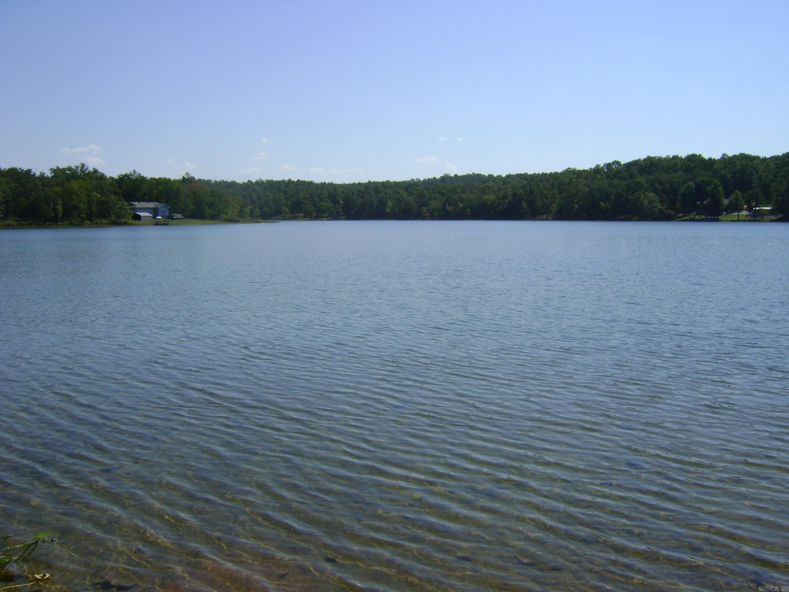 Great Lake Lot Priced to Sell!!! Come build your dream retirement home or get-away vacation home on beautiful Diamond Lake. This property has been surveyed and has an Arkansas soil percolation test completed for a two bed, two bath home. It is a non ski lake and a no wake lake. You can build a boat dock to park your boat, swim, fish, or just enjoy the lake. It is close to the golf courses, 640 acre Crown Lake to ski and fish, also. Come see this lot today before you miss out on this great opportunity.