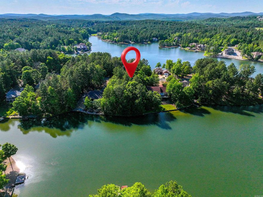 Over 1/2 Acre WATERFRONT Lot on Beautiful Lake Granada! Gentle slope to the water with POA water, sewer, & electricity available. East/SE exposure to enjoy the morning sunrise over the lake and cooler afternoons in the summer! Lake Granada is 54 Acres in size and you can walk to the Granada Golf Course and Driving Range! 26,000 gated acres - Hot Springs Village has 11 lakes and 9 golf course, 20+ miles of walking trails, a fitness center, 2 beaches, 2 marinas, 2 pools (one indoor and 1 outdoor), 24 churches, clubs and activities, a performing arts center, tennis, pickleball, miniature golf, an archery range, bocce ball, a dog park and much more!