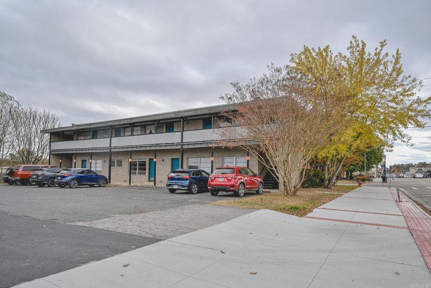 Incredible investment opportunity in the heart of Mena! This 7 unit apartment building is located on Mena St. and features FIVE-1 bedroom apartments and TWO-2 bedroom apartments. Each unit is spacious with large windows, ample storage space, and parking! There are currently tenants in 5 of the units. Just minutes from the Mountain Bike Trails and walking distance to all amenities, this a fantastic opportunity for the right buyer!