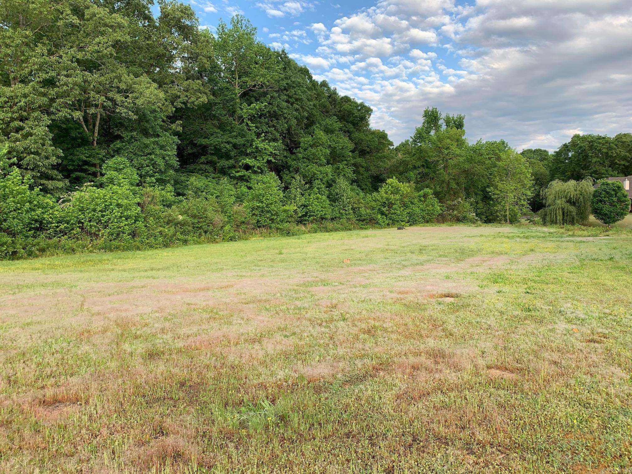 Come build your dream home on the only land left in the gated neighborhood, Valley Creek! It features privacy and beautiful creek that runs along the backside of the property.  This is now a premiere neighborhood in NLR featuring beautiful, custom built homes. It is centrally located in town, only 5 minutes from restaurants and shops and 10 mins from downtown LR.   Three parcels sold together. Call today!