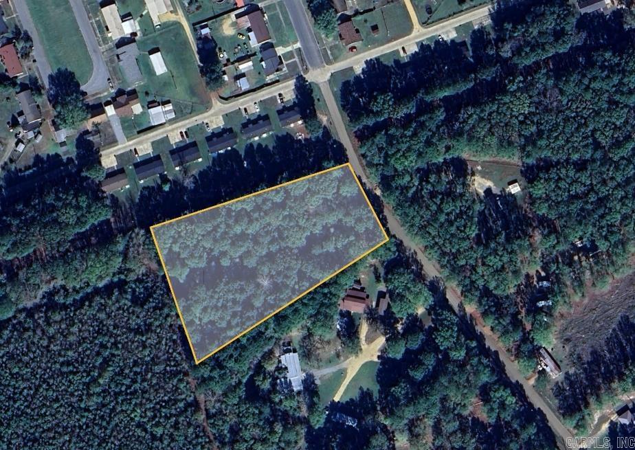 East Camden/Harmony Grove land! Just under 3 acres, and just outside of city limits, this parcel offers flexibility to build or add a mobile or modular home. Mixed ages of trees, ready for you to choose where to add your homesite.