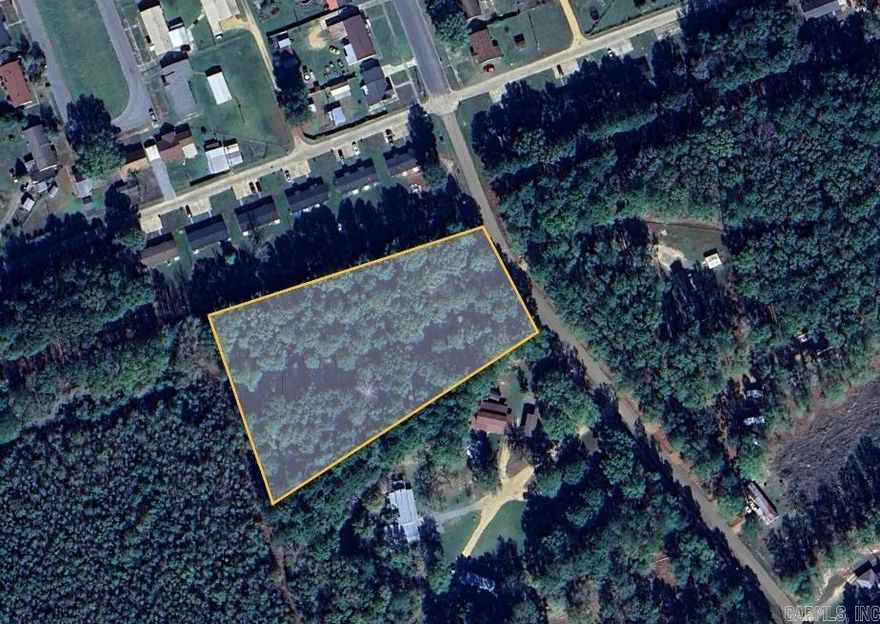 East Camden/Harmony Grove land!  Just under 3 acres, and just outside of city limits, this parcel offers flexibility to build or add a mobile or modular home.  Mixed ages of trees, ready for you to choose where to add your homesite.