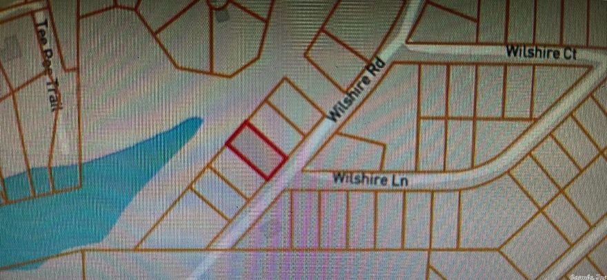 Beautiful lake front lot in Fairfield Bay! 75x140 nestled at the end of part of snake head cove! Great Place to build your new home! All utilities at road! No mobile or manufactured homes allowed! minimum 1400 sf home allowed!  City Sewer available! Look for sign on right before pavement ends!  area amenities: golf, atv trails, swimming pools, marina, restaurants, boat docks, bowling, miniature golf! A wonderful place to live!