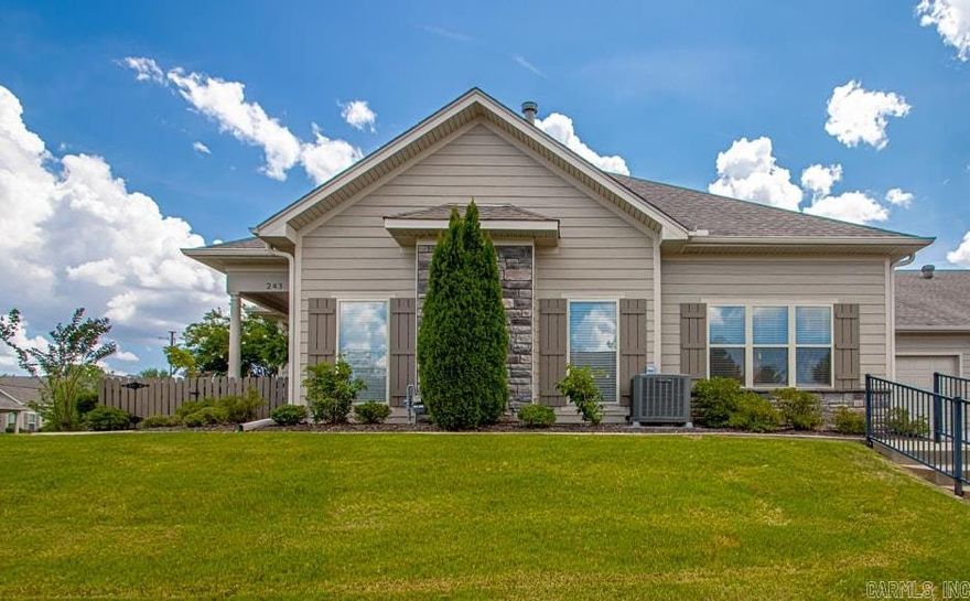 Enjoy stunning views from this freshly painted one-level patio home in Mountain Terrace Estates! Featuring three bedrooms with new carpet, two baths, and a two-car garage, the open layout includes hardwood floors, abundant natural light, and a cozy gas fireplace. The kitchen offers a gas range, stainless appliances, granite counters, and a built-in desk. The covered, fenced patio provides privacy and is perfect for entertaining. The spacious primary suite includes double vanities, a walk-in shower with bench, walk-in closet, and a linen closet. Comfort-height toilets, laundry with sink, and access to the community clubhouse, pool, and fitness center complete the package.