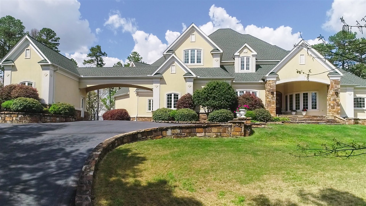 Absolutely Exquisite are the only words that can truly describe this property! Features include two wet bars, full bar upstairs, two gas log fireplaces, granite countertops, heated floors in the master bath and lots of windows that let in the perfect amount of natural light. This home is perfect for entertaining as well as relaxing! You have to see this one in person to capture its beauty. Call to schedule your personal showing!