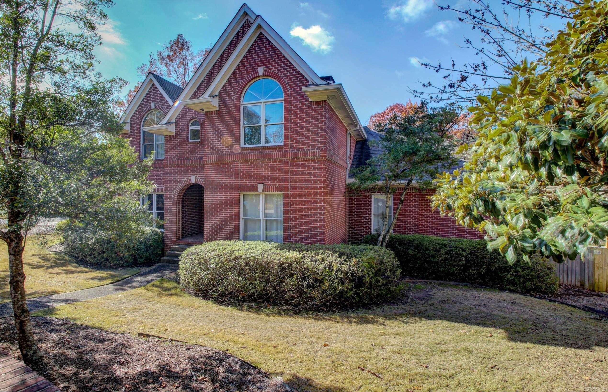 Don't miss out on this stunning, spacious home on a large corner lot in West Little Rock, filled with an abundance of natural light! The breathtaking open-concept kitchen and living area have been beautifully remodeled, offering a modern and inviting space perfect for entertaining. The master suite on the main level has been completely upgraded with sleek, contemporary designs. Step outside to a backyard oasis featuring a massive deck and a luxurious in-ground saltwater pool. The pool area has been fully renovated with a new pump and heater hookups, and there's a cozy covered patio with a fireplace for those cool evenings. Upstairs, you'll find three additional bedrooms and a versatile bonus room, while above the garage, a spacious in-law suite awaits. The home also boasts refinished floors, a refreshed fireplace, smart electric blinds, and a Ring security system. Plus, there's a lovely green space behind the house, perfect for outdoor activities. This home is truly a gem, blending modern upgrades with classic charm.