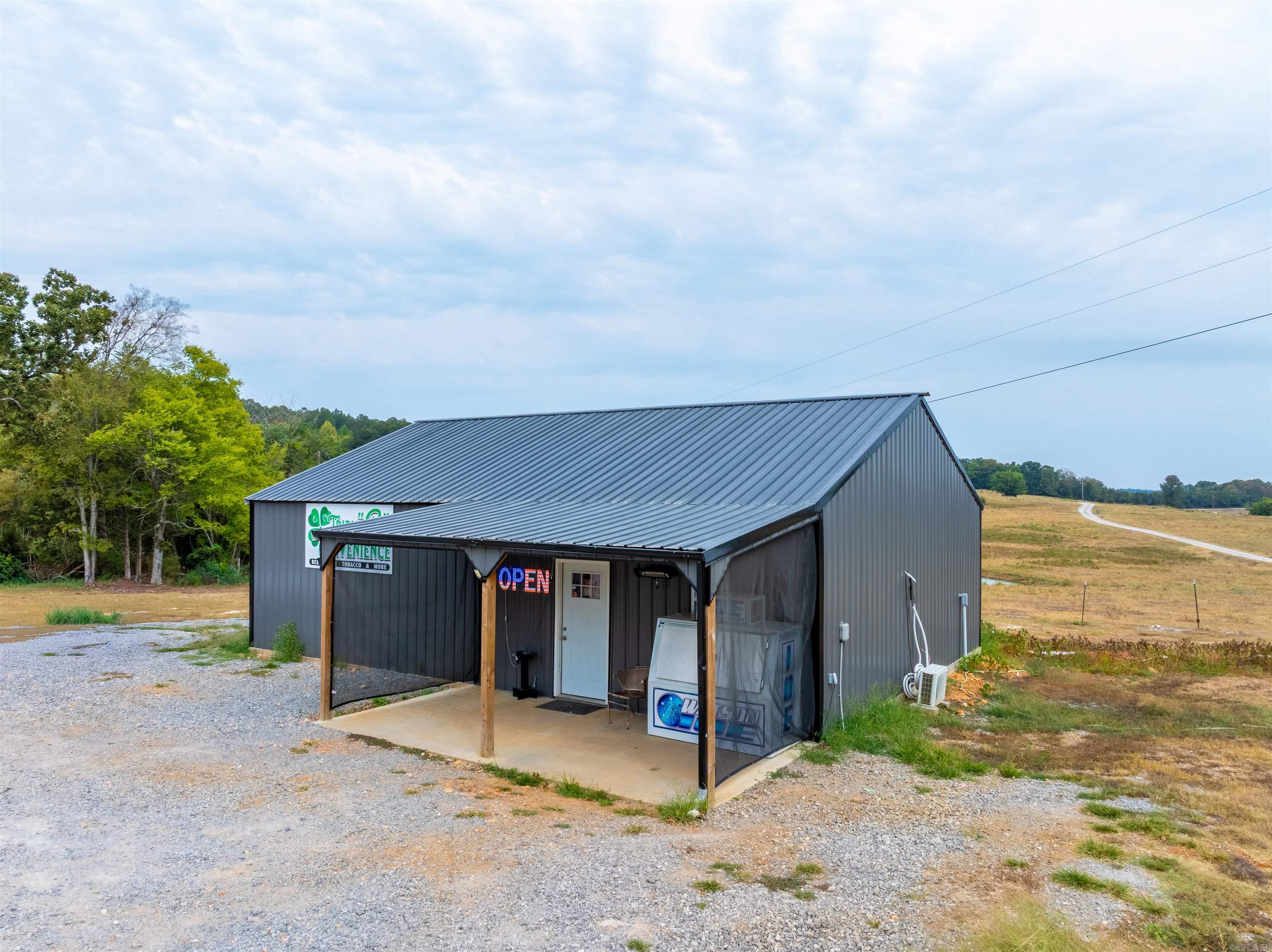 Like-new 1,200 sq ft commercial building on 1 acre in Poughkeepsie, AR with walk-in cooler, bathroom, and open floor plan. Originally built as a convenience store, this property is highly versatileāconvert to residential with ease, or use for a butcher shop, taxidermy, workshop, or retail space. Affordable investment near the Strawberry River in a prime hunting and farming area. 1,200 sq ft open layout with walk-in cooler Bathroom with sink and toilet Concrete floors, all-electric Room to expand or add a residence Prime location in Sharp County hunting & farm community This is a rare opportunity to own a flexible, affordable commercial property in north-central Arkansas.