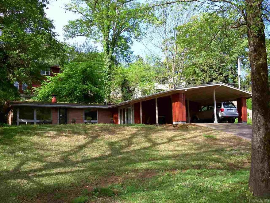 Just steps away from fishing at this newly remodeled contemporary across from lake number one! Open air, vaulted ceilings and lots of windows to enjoy gorgeous lake views.  Living area w/ true masonry fireplace. Open kitchen/ dining features new counters, stainless appliances and tiled flooring. Subway tiled hall bath. Still time to choose some decor! Large master w/ spacious bath opens to patio area.  Low maintenance backyard.  Enjoy lakeside strolls, wetting your hook, or just watching waterfowl. Hurry!