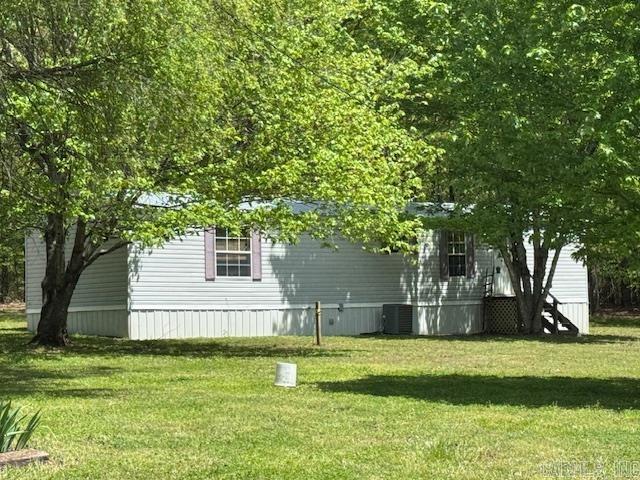 SECLUDED MH ON 4 ACRES! 2 Bed, 2 Bath Mobile Home on 4 Private Acres – Brand New Carpet & Linoleum. Living room/kitchen combo with slightly vaulted ceiling. Appliances included. Master bedroom with new carpet, joining bathroom with soaking tub and separate shower. Guest bedroom, bath and utility room. The exterior features a spacious covered deck, storage shed and small pond. Enjoy the peace and privacy with this well-kept mobile home on 4 secluded acres. Surrounded by nature, this property offers the perfect blend of comfort and quiet, ideal for anyone seeking a private retreat or a rural homestead. Owner Agent/Broker.
