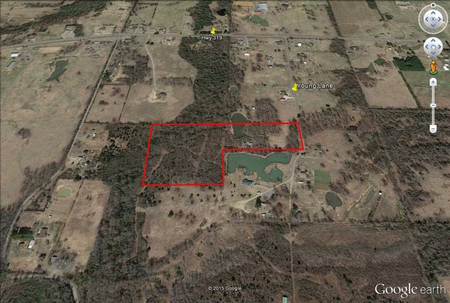 The Price of the land alone would be worth the purchase price, plus you get 2 mobile homes and an Overbuilt Storage Building with loft "To Boot".  All on 13.49 acres. Rural land some cleared, but mostly wooded, hardwood timber with creek in rear.  Several 4 wheeler trails through the property.   Hunt out your back door and fish in your stock pond.  Great weekend get away or home site.  City water is down the road.  Boundary pictures are for location purposes only.  A survey is recommended.