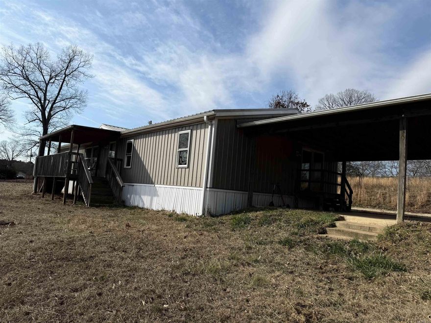 Mobile home with 3-beds and 2-full baths.