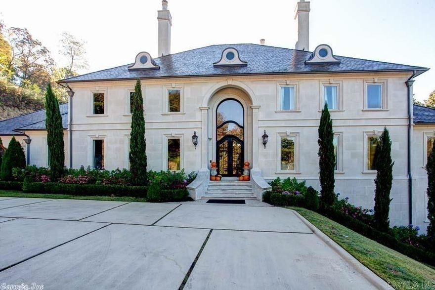 One of a kind 5.5 acre estate on Lakewood Lake. Precast stone, gated w private dock. Salt water pool, waterfall, natural stone, outdoor fire pit & veranda for entertainment. Coffered ceiling library, hand painted silk walls in dining, copper sink wet bar, site finished hdwds, 2 laundry rooms, mud room, cozy hearth room & theater. Chef's kitchen, subzero, 2 Bosch DWs, Wolf 6 burner, Advantium oven, granite & island. Indoor basketball court, batting cage, safe room, wine cellar, sauna, gym & elevator. WOW!!