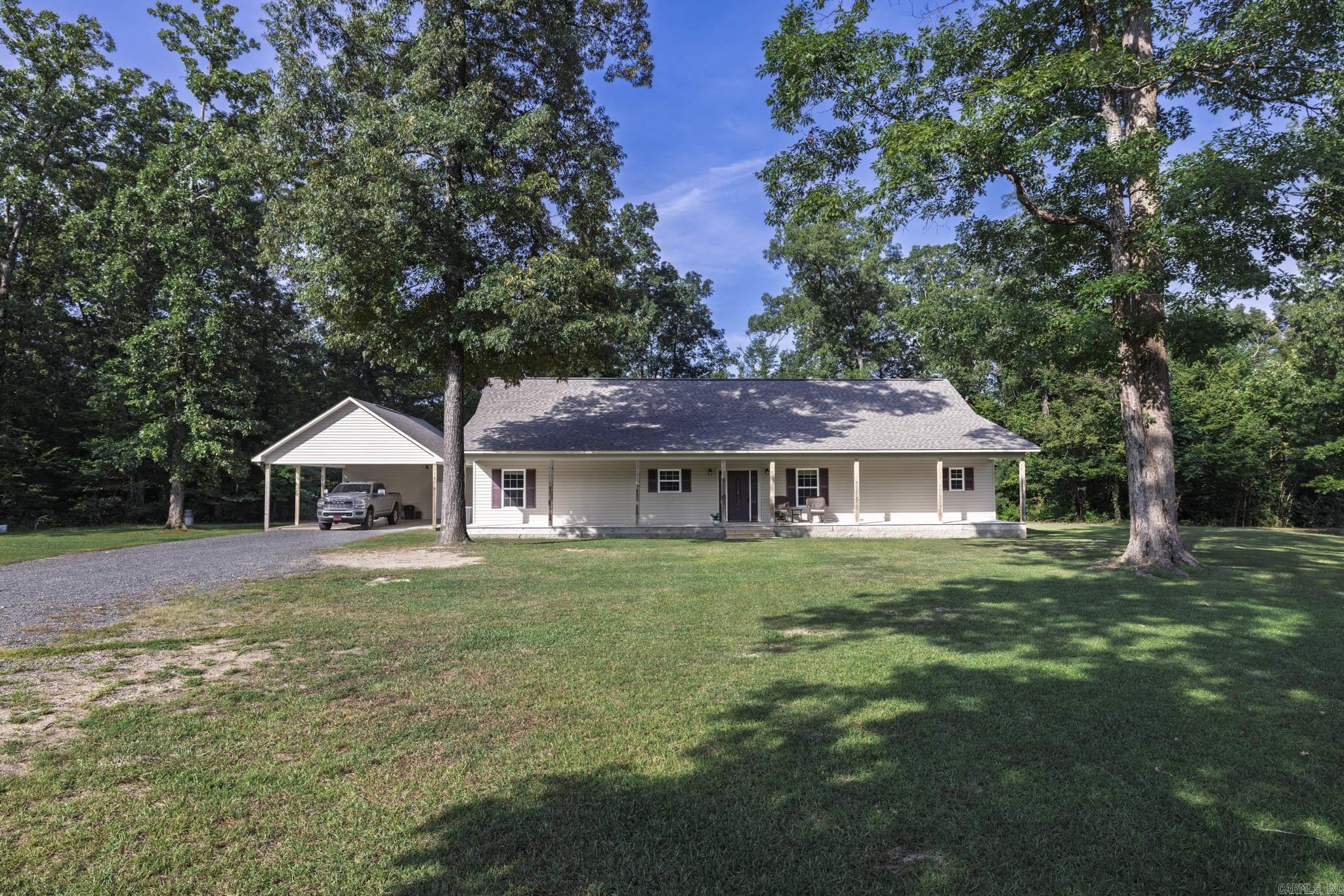 Welcome to your dream country retreat just minutes from Arkadelphia. This beautiful three-bedroom, three-bath home sits on over 10 acres of peaceful land and features a stunning two-acre stocked pond, perfect for fishing and enjoying nature. Built in 2010, the home offers vaulted ceilings in the living and dining rooms, an open-concept kitchen ideal for entertaining, and a spacious primary suite complete with a walk-in shower, jetted tub, and oversized closet. The two additional bedrooms are generously sized, providing plenty of space for family or guests. Step outside to enjoy the large front and back decks, an above-ground swimming pool, and covered carport parking with extra storage. A 35x50 shop adds even more value, including a heated and cooled 600 sqft one-bedroom, one-bath garage apartmentāperfect for guests or rental income. With its blend of comfort, space, and convenience just outside the city, this property has everything youāve been looking for. Agents see agent remarks.
