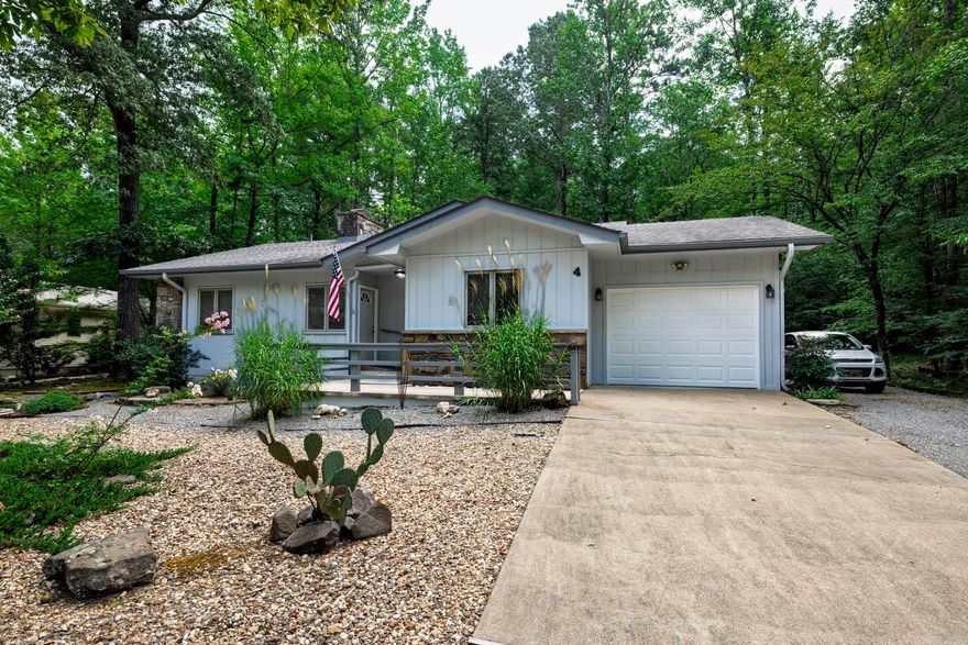 Very well maintained, move in ready home. 3 bedrooms and 2 full baths. Updated primary bath has walk in shower and guest bath has a tub/shower combo. Kitchen/dining/living semi open floor plan with breakfast bar. No popcorn ceilings, luxury vinyl plank flooring throughout, wood burning fireplace, 15'x15' heated and cooled sunroom with vaulted ceiling. Nice deck off the sunroom. Single car garage with extra parking space to the side. Roof replaced in 2018. The internet provider is Hyper Fiber. This home is located on a quiet cul de sac with common property to the rear and a vacant lot on one side.