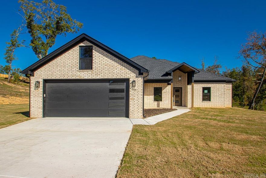 Welcome to this serene oasis sitting on 1.27 acres in Winchester Estates Subdivision. This stunning 4 bedroom, 2.5 bathroom home offers 2200 sqft of thoughtfully designed living space. The open/split floor plan features a cozy wood-burning fireplace, perfect for those chilly nights. The kitchen includes a large island, walk-in pantry for ample storage, while the primary suite boasts a spacious walk-in closet that conveniently connects to the laundry room. Relax in the luxurious primary bathroom with a walk-in tile shower and soaking tub.