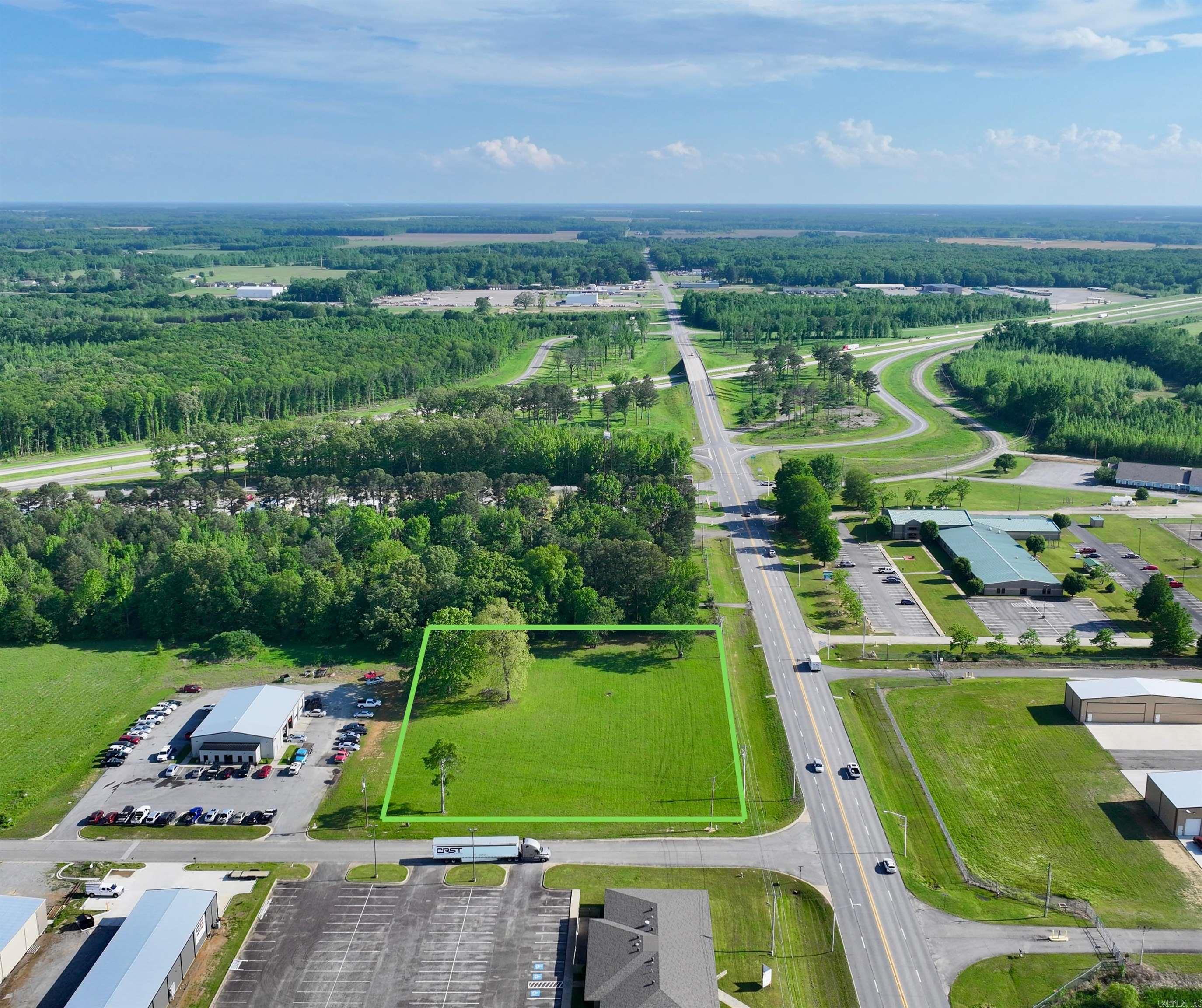 Great commercial opportunity. This property is situated just feet from exit 42 on Interstate 57 and directly across from the Searcy Municipal Airport. This cleared, level land is Zoned C-2 and ready for development.