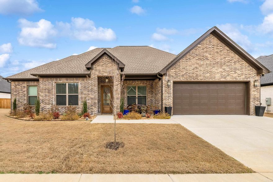 Welcome to 8028 N Shoreline — a home that blends everyday comfort with elevated living in the highly desirable Hurricane Lake Estates. Thoughtfully tucked away in this sought-after community, this 4-bedroom, 2.5-bath home also offers a dedicated office space, perfect for working from home, managing a busy household, or creating a quiet retreat. The layout provides both function and flow. Natural gas service brings efficiency and comfort with a tankless water heater, cozy gas log fireplace, and gas stove insert — details that add warmth and convenience you’ll appreciate year-round. Need reliable connectivity? You’re covered with lightning-fast AT&T fiber internet — perfect for streaming, work, gaming, or staying connected without interruption. Living in Hurricane Lake Estates means access to neighborhood amenities including tennis courts, playgrounds, community pool, and lake access — offering recreation and relaxation just minutes from your front door. All of this, zoned for Bryant School District and conveniently located minutes from Alcoa Road exit off I-30, making commuting simple. This home delivers location, lifestyle and livability- all in one.  Agents see remarks.