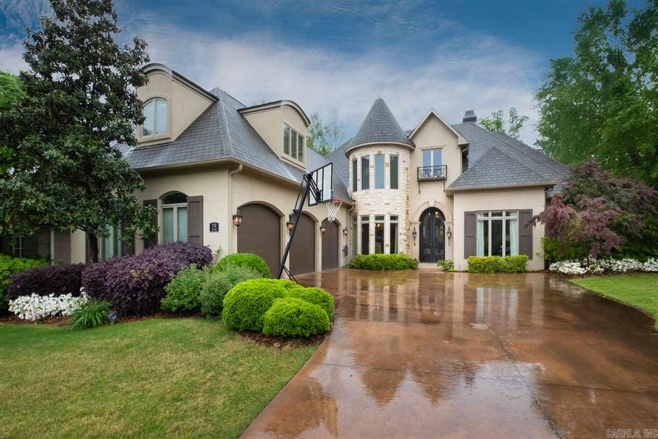 Unbelievable showcase in gated neighborhood, cul-de-sac w/private green space. Outdoor living w/flagstone patio, complete kitchen, TV, & covered patio. Iron door, travertine & hardwoods down, 10' ceilings, open hearth room w/stone FP, custom drapes, central vac, surround sound, Pella windows. Gourmet kitchen- wet bar, gas cooktop, double oven, granite island. Sitting area in master, quartz c.tops, walk thru travertine shower, large closet w/built-ins. Hardwoods & gun closet in office. Game room w/buitl-ins.