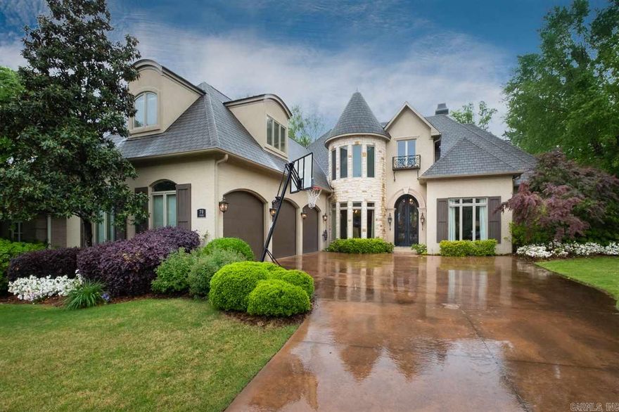 Unbelievable showcase in gated neighborhood, cul-de-sac w/private green space. Outdoor living w/flagstone patio, complete kitchen, TV, & covered patio. Iron door, travertine & hardwoods down, 10' ceilings, open hearth room w/stone FP, custom drapes, central vac, surround sound, Pella windows. Gourmet kitchen- wet bar, gas cooktop, double oven, granite island. Sitting area in master, quartz c.tops, walk thru travertine shower, large closet w/built-ins. Hardwoods & gun closet in office. Game room w/buitl-ins.