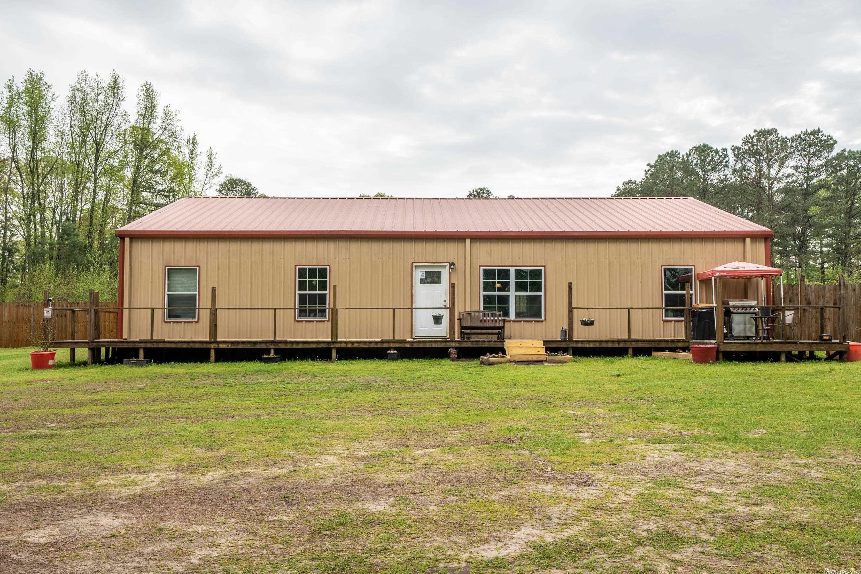 Country Living at its Best. Farmhouse Style 4 Bedrooms/3 bathrooms. Split floor plan. Open kitchen / living room. Mudroom/ laundry combo. 2400 square foot. 3.22 Acres. Kimzey city Water. Private, serene setting. NEW HVAC, and NEW DISHWASHER