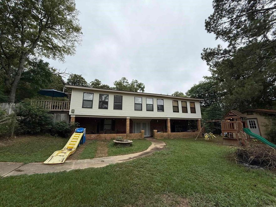 Located minutes from Lake Greeson and the Crater of Diamonds State Park, if you are looking for Space, this 2-story, walk-out basement offers over 3,800 sq ft of living space to include 4 bedrooms and 3 full baths.  Large living room, chef's kitchen offers, double refrigerators, with ice makers, double wall oven with warmer, built in microwave, dishwasher, gas stove top with breakfast bar.  Lots of cabinets and built-ins, separate dining room, additional office space or bonus area. Master suite with double closets and walk in dressing room/closet with vanity and sink, master bath, jacuzzi tub, shower and vanity with extra storage.  Downstairs offers an additional bedroom, laundry room with cabinets and storage, full bathroom and large entertaining room, walk out french doors to covered patio.  Partially fenced, storage building and garden shed, double garage, gas hot water heater, 2 CH/CA units, and newer roof.  Contact our office for more details, or to schedule a private showing.