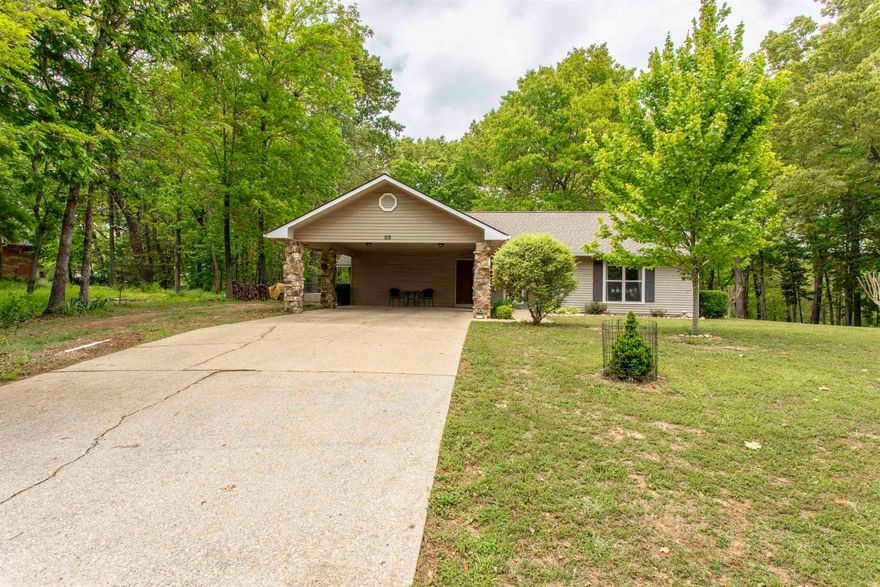 Thunderbird Lakeview home   Welcome to 23 Winnebago Circle in Cherokee Village! This well-kept 3 bedroom, 2 bath home offers 1,651 square feet of comfortable living space and sits on **three mostly flat corner lots** with beautiful landscaping and plenty of room to enjoy the outdoors. Split floor plan with semi open concept.   Inside, you’ll find a spacious living room, hardwood floors, and a functional kitchen featuring stainless steel appliances. The inviting sunroom is equipped with a mini split and overlooks the fenced backyard, making it a great spot to relax year-round. Outside, the property offers a large carport, covered patio, storm shelter, and a fenced backyard with lots of usable space. 6' X 8' in ground storm shelter installed 2025. Outside storage areas.  Major updates include a roof, HVAC system, and water heater all within the last five years, giving buyers extra peace of mind. Located directly across the street from Lake Thunderbird, this property offers a wonderful setting close to one of Cherokee Village’s favorite lakes.  **Please note: occupancy will not be available until July 24th.**