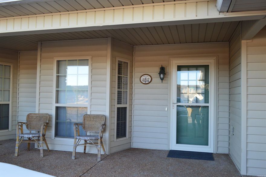 Great retirement location, with views.  The back patio is partially screened in, so you can enjoy sitting outside, no matter the weather.  Very clean and ready to move into.  Furnace is 1 year old and the entire building has just installed a  new roof March 2025.  You like to fish or boating?  Greers Ferry Lake and Little Red River are just 5-8 minutes away.