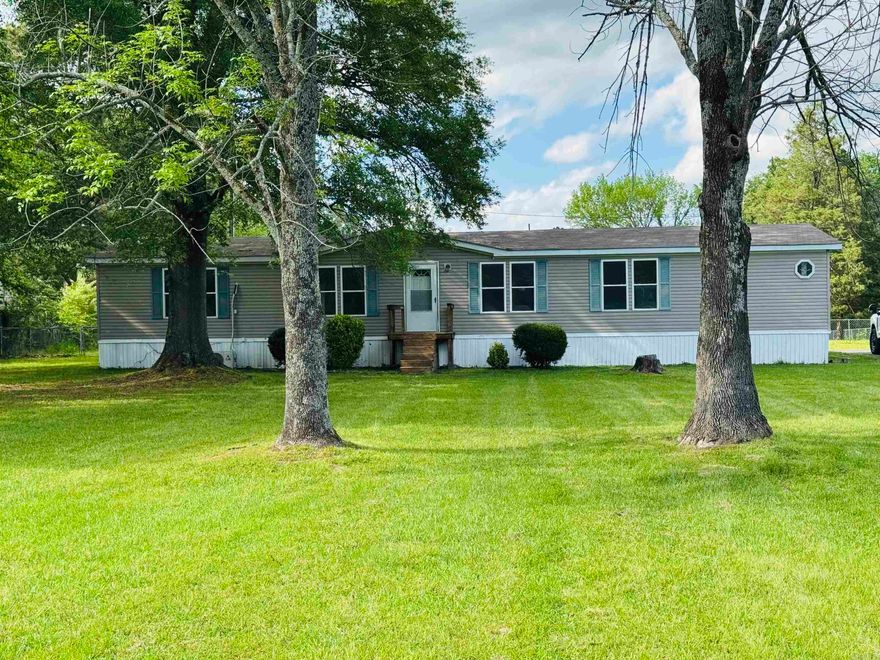 Check out this home sitting on 1.4 acres with huge fenced in back yard!  Great spot just minutes from the back gate of LRAFB that won’t break the bank.  Home is on permanent foundation and has nice open layout with fireplace centering the living area. New LVP flooring installed throughout the entire house as well as new cooktop with retractable vent-a-hood in the island.  Over sized Master bedroom has 2 walk in closets and corner tub and shower.  Covered back porch to sit back and relax while enjoying your coffee.  Central heat and air as well as mini split just installed thats very efficient. Property has all utilities  and has a well if wanting to use for gardening or watering. Roof replaced in 2020. No restrictions, so able to have chickens or livestock if desired! It is very hard to find a home this size with over an acre of ground for less than $80 a sft.  Call your realtor and check it out before its too late!!