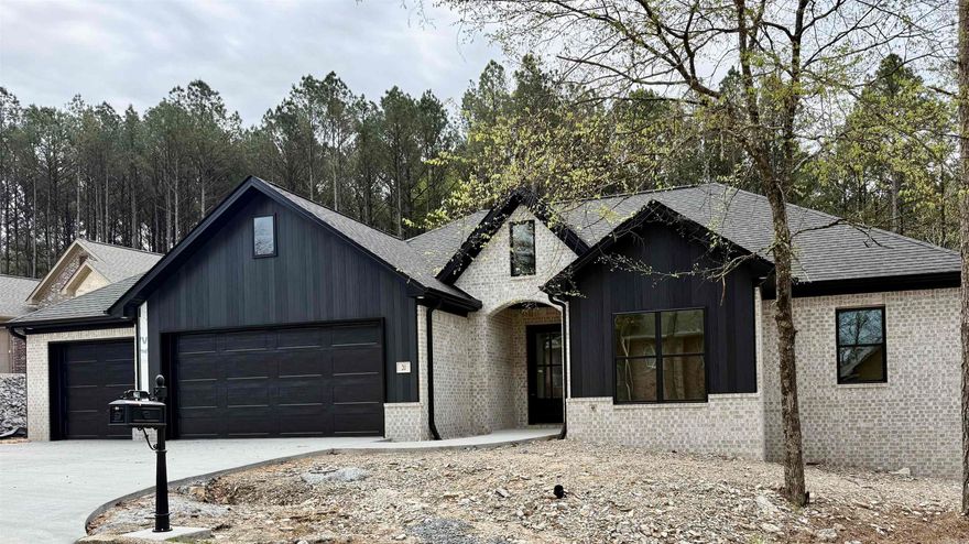 Live the Diamante Dream: Luxury Awaits in Hot Springs Village. Elevate your lifestyle with this stunning new construction masterpiece by Renaissance Homes. Nestled in the prestigious Diamante Subdivision, this home isn't just a residence—it’s your gateway to a premier country club lifestyle. The Highlights: The Sycamore Floorplan: 2041  sq. ft. of seamless, open-concept design perfect for entertaining. A gourmet kitchen boasting sleek granite countertops and top-tier appliances. Escape to a lavish ensuite featuring a custom walk-in tile shower that feels like a daily spa visit. An expansive 3-car garage designed with the enthusiast in mind—plenty of room for your vehicles and that essential golf cart. You are mere minutes from the world-class Diamante Clubhouse. Whether you're hitting the links or enjoying a sunset dinner, everything you need is at your fingertips. Modern, energy-efficient, and backed by a 1-Year Builder’s Warranty, this is the "New Construction" opportunity you’ve been waiting for.