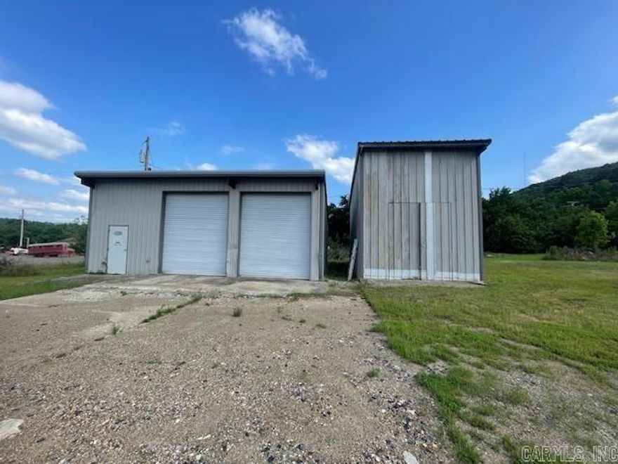 High-Visibility Commercial Opportunity on Heavily Traveled Highway! Versatile 1,020 sq ft commercial building offering excellent exposure and easy access in a high-traffic location. The open shop space features dual roll-up doors and a flexible layout suitable for a wide range of business uses. Potential uses include automotive repair, car or boat detailing, paint shop, bicycle repair, small engine service, or conversion to a dance or fitness studio, martial arts or karate school, gaming or esports studio, training facility, hobby workshop, and more. Endless possibilities in a prime commercial location. The property includes space for an office or customer waiting area and a 480 sq ft detached storage building that can also function as a garage, ideal for equipment, vehicles, or inventory. Strong visibility and adaptability make this a great option for an owner-operated business or an income-producing investment with leasing potential.